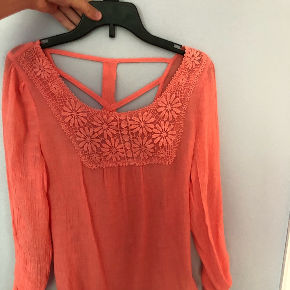 Coral long-sleeved lace blouse